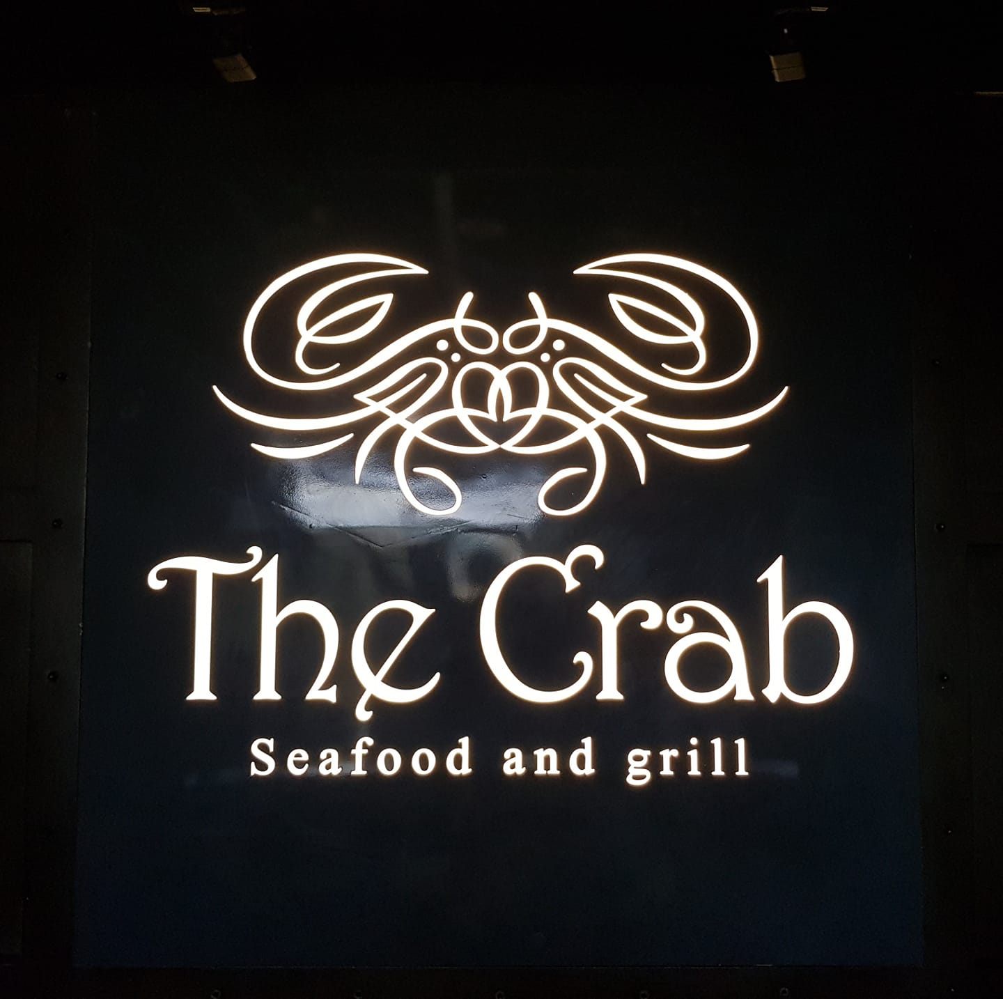 Cebu Business Directory - The Crab Seafood & Grill logo